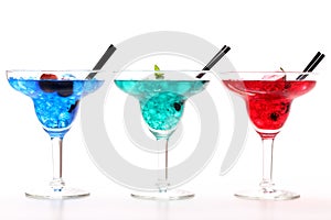 Colorful cocktails on white background