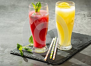 Colorful cold summer drinks with fruit