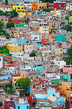 Colorful crowd american city architecture in hill, Guanajuato, Mexico photo