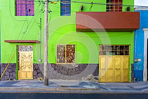 Colorful colonial Guadalajara houses and streets in historic city center Centro Historico near Guadalajara Basilica photo