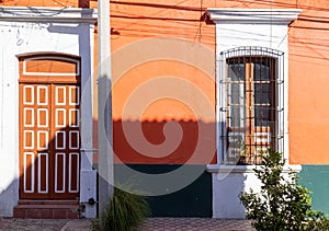 Colorful colonial Guadalajara houses and streets in historic city center Centro Historico near Guadalajara Basilica photo