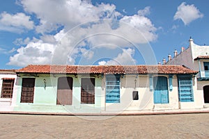 Colorful colonial houses in the streets of the old charming town of Camaguey, Cuba UNESCO World Heritage
