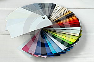 Colorful color guide with palette of paint samples on white background with copy space. Catalog for tinting