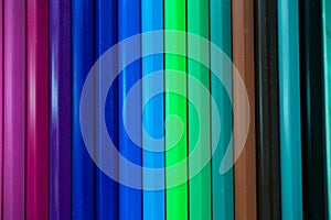 Colorful color pencils as background for design. Close up view of multicolor abstract background.
