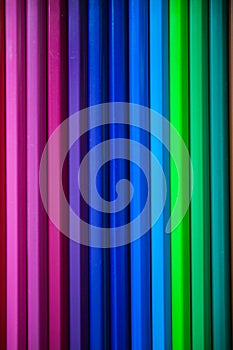 Colorful color pencils as background for design. Close up view of multicolor abstract background.