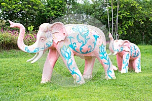 Colorful concrete elephant statue with Thailand pattern in park