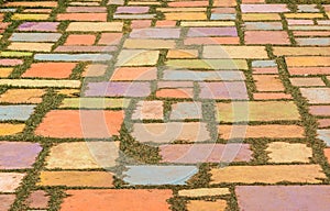 Colorful concrete floor on green grass