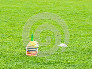 Colorful cones in football field, colorful markers in trainning grassfield