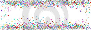 Colorful confetti border isolated on white background with copy space. Abstract frame template for holiday banner, birthday