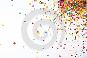 a colorful confetti explosion on white background