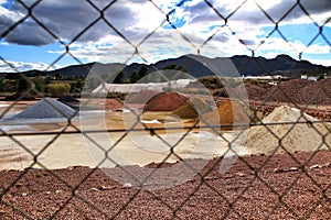 Colorful construction aggregate mountains in Alicante, Spain