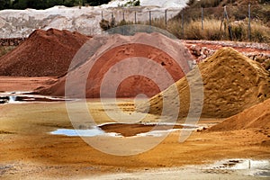 Colorful construction aggregate mountains in Alicante, Spain