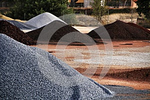 Colorful construction aggregate mountains in Alicante, Spain