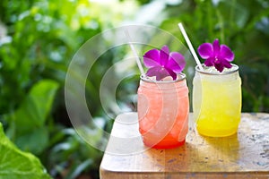 Colorful cool drink in summer on nature background