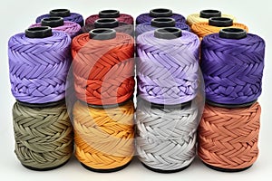 Colorful cotton threads on spools for sewing and embroidery projects, ideal for crafting enthusiasts