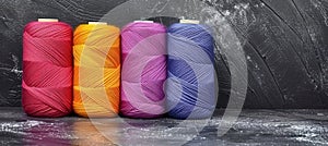 Colorful cotton threads on spools for sewing and embroidery projects, ideal for vibrant creations