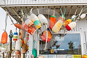 Colorful crab trap floats hanging outside a shop in Garibaldi, Oregon