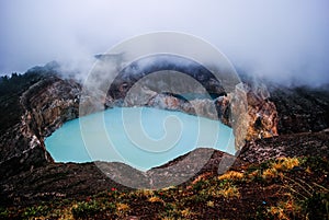 Colorful crater of Kelimutu volcano photo