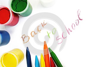 Colorful crayons and water-colors, back to school