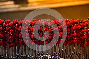 Colorful crowns for sale made of fake flowers