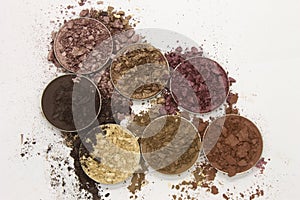 Colorful crushed Eyeshadow on a White background