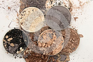 Colorful crushed Eyeshadow on a White background