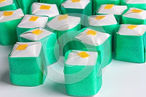 Colorful cube in Thai dessert  shape handcraft ribbon for donate to give away alms by scattering ,The Coin sprinkling