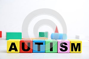 Colorful cubes with word AUTISM