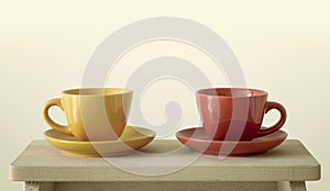 Colorful cups on table