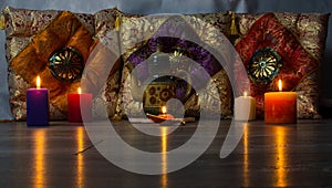 Colorful cushions in Oriental style ceramic teapot