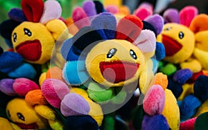 Colorful cute Sunflower smiley face doll closeup view