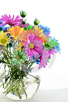 Colorful Daisies In A Vase