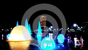 Colorful dancing fountain at night in Luneta Park photo
