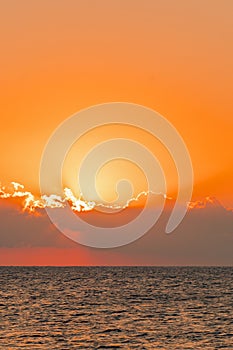 Colorful dawn over the sea, Sunset. Beautiful magic sunset over the sea. vertical photo. toned