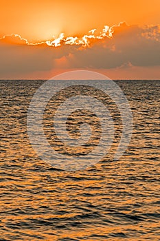 Colorful dawn over the sea, Sunset. Beautiful magic sunset over the sea. vertical photo. toned