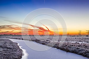 Colorful dawn over a winter landscape