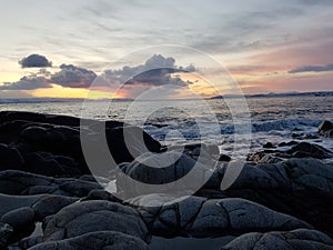 Colorful dawn sky over arctic circle fjord view in nordkapp county