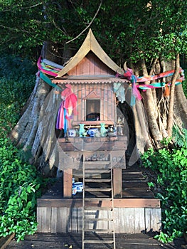 Colorful decorated buddhist shrine and offerings