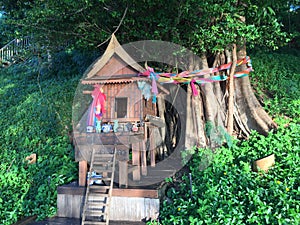 Colorful decorated buddhist shrine and offerings