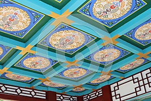 Colorful decorated ceiling in a temple in the Seven Star Crags National Park, Zhaoqing, China