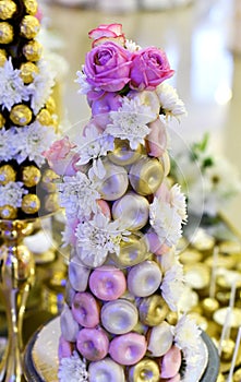 colorful decorted glazed donuts on a wedding party