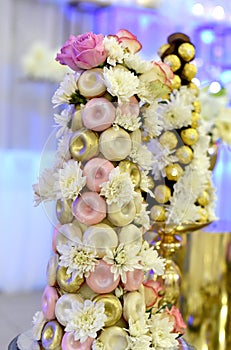 colorful decorted glazed donuts on a wedding party