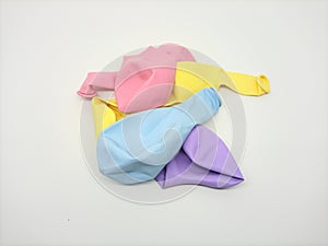 colorful deflated rubber balloons