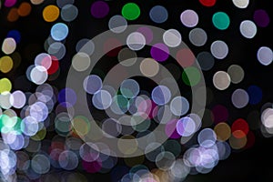 Colorful Defocus Abstract bokeh light effects on the night black background texture