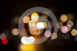 Colorful Defocus Abstract bokeh light effects on the night black background texture