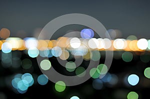 Colorful defocused bokeh lights in blur night background