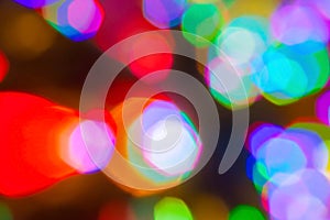 Colorful defocused bokeh lights in blur night background