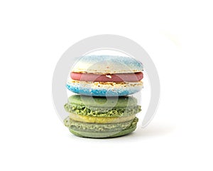 Colorful and delicious French macaroon or macaron isolated on white