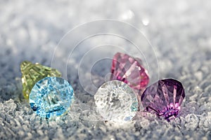 Colorful diamonds and frozen crystals on frost