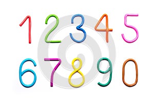 Colorful digits made from plasticine. Modeling clay number set from 1 to 9. Bright colored volumetric figures for children